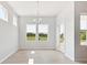 Bright dining area with hardwood floors and access to patio at 1035 Bull Dog Ln, Wingate, NC 28174