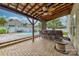 Covered patio with outdoor kitchen and seating area at 1013 Taylor Glenn Ln, Indian Trail, NC 28079