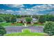 Community clubhouse with pool, tennis courts, and parking at 1013 Taylor Glenn Ln, Indian Trail, NC 28079