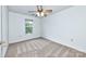 Bright bedroom featuring neutral carpeting and a window at 1013 Taylor Glenn Ln, Indian Trail, NC 28079