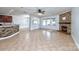 Gathering room with tile floors, fireplace, and ceiling fan at 1013 Taylor Glenn Ln, Indian Trail, NC 28079