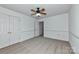 Well-lit bedroom with double closets and ceiling fan at 1013 Taylor Glenn Ln, Indian Trail, NC 28079