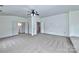 Main bedroom with carpet and access to bath at 1013 Taylor Glenn Ln, Indian Trail, NC 28079