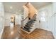 Elegant entryway with hardwood floors and a grand staircase at 300 Eagle Bend Dr, Waxhaw, NC 28173