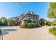 Brick home with stone accents and a large circular driveway at 300 Eagle Bend Dr, Waxhaw, NC 28173