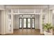 Bright and spacious entryway with hardwood floors and a large double door at 300 Spanish Oak Ln, Gastonia, NC 28056