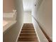 Carpeted staircase leading to the upper level at 416 Galesburg Dr, Monroe, NC 28110