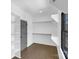 Spacious walk-in closet with ample shelving and hanging space at 1106 Anniston Pl # 51, Indian Trail, NC 28079