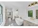 Elegant bathroom with soaking tub, double vanity, and modern fixtures at 1106 Anniston Pl # 51, Indian Trail, NC 28079
