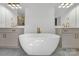 Modern bathroom with free-standing tub and double vanity at 1106 Anniston Pl # 51, Indian Trail, NC 28079