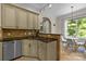 Kitchen features corner sink, granite countertops, and stainless steel appliances at 7230 Timber Ridge Dr, Mint Hill, NC 28227