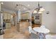 Modern kitchen with a breakfast bar, granite countertops and stainless steel appliances at 7230 Timber Ridge Dr, Mint Hill, NC 28227