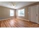 Bright bedroom featuring hardwood floors and a ceiling fan at 1158 Evans Ave, Rock Hill, SC 29732