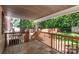 Relaxing back patio overlooking fenced yard with steps leading down at 1158 Evans Ave, Rock Hill, SC 29732