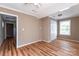 Spacious bedroom with hardwood floors and access to hallway at 1158 Evans Ave, Rock Hill, SC 29732