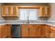 Modern kitchen with stainless steel appliances and light wood cabinets at 1158 Evans Ave, Rock Hill, SC 29732