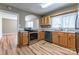 Modern kitchen with stainless steel appliances and light wood cabinets at 1158 Evans Ave, Rock Hill, SC 29732