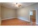Spacious bedroom with hardwood floors and a ceiling fan at 1158 Evans Ave, Rock Hill, SC 29732
