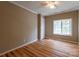 Simple bedroom with hardwood floors and a ceiling fan at 1158 Evans Ave, Rock Hill, SC 29732