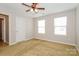 Well-lit bedroom with neutral walls and carpet flooring at 3041 Rhododendron Pl, Clover, SC 29710