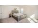 Bright bedroom with a queen-size bed and plenty of natural light at 168 Ravensara Ave, Fort Mill, SC 29715