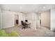 Loft offering home office space with views into the laundry room and other bedrooms at 168 Ravensara Ave, Fort Mill, SC 29715