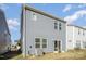 Gray house exterior with small backyard and sliding glass door at 168 Ravensara Ave, Fort Mill, SC 29715