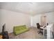 Loft area with a desk and futon, offering flexible living space at 168 Ravensara Ave, Fort Mill, SC 29715