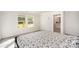 Bright bedroom with two windows and en-suite bathroom access at 168 Ravensara Ave, Fort Mill, SC 29715