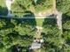 House nestled in a wooded area with a long driveway at 7714 Old Waxhaw Monroe Rd, Waxhaw, NC 28173