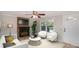 Living room with fireplace and large windows at 7714 Old Waxhaw Monroe Rd, Waxhaw, NC 28173