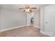 Simple bedroom with carpet and neutral walls at 7714 Old Waxhaw Monroe Rd, Waxhaw, NC 28173