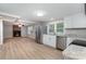 Modern kitchen with granite counters and white cabinets at 7714 Old Waxhaw Monroe Rd, Waxhaw, NC 28173