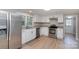 Updated kitchen featuring stainless steel appliances and granite countertops at 7714 Old Waxhaw Monroe Rd, Waxhaw, NC 28173