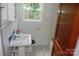 Simple bathroom with white tile and pedestal sink at 203 West Dr, Albemarle, NC 28001