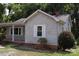 Gray siding one-story house with a covered porch at 203 West Dr, Albemarle, NC 28001
