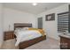 Comfortable bedroom with a wooden bed frame and plenty of natural light at 29060 Low Country Ln, Lancaster, SC 29720