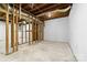 Unfinished basement area with exposed framing at 115 E Georgia Ave, Bessemer City, NC 28016