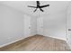 Spacious bedroom with two closets and ceiling fan at 115 E Georgia Ave, Bessemer City, NC 28016