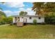 Charming white ranch home with a newly updated deck and landscaping at 115 E Georgia Ave, Bessemer City, NC 28016