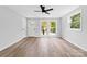 Bright living room with hardwood floors and plenty of natural light at 115 E Georgia Ave, Bessemer City, NC 28016