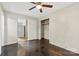 Bright bedroom with hardwood floors, a closet, and access to kitchen at 323 20Th St, Kannapolis, NC 28083