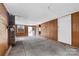 Unfinished basement area with wood paneling at 323 20Th St, Kannapolis, NC 28083