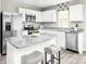 Modern kitchen with white cabinets, granite countertops, and stainless steel appliances at 2553 Bruner Ct, China Grove, NC 28023