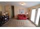 Living area with red couch and access to other rooms at 359 Pinnacle Rd, Kings Mountain, NC 28086