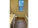 Bathroom with tub and single vanity at 258 Indian Paint Brush Dr, Mooresville, NC 28115