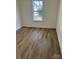 Bright bedroom with large window at 258 Indian Paint Brush Dr, Mooresville, NC 28115