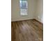Simple bedroom with window and view at 258 Indian Paint Brush Dr, Mooresville, NC 28115
