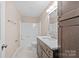 Updated bathroom features a vanity with quartz countertop, a shower/tub combo, and tile flooring at 2090 Cardinal Hill Dr, Rock Hill, SC 29732