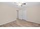 Bedroom with wood-look flooring and double door closet at 2090 Cardinal Hill Dr, Rock Hill, SC 29732